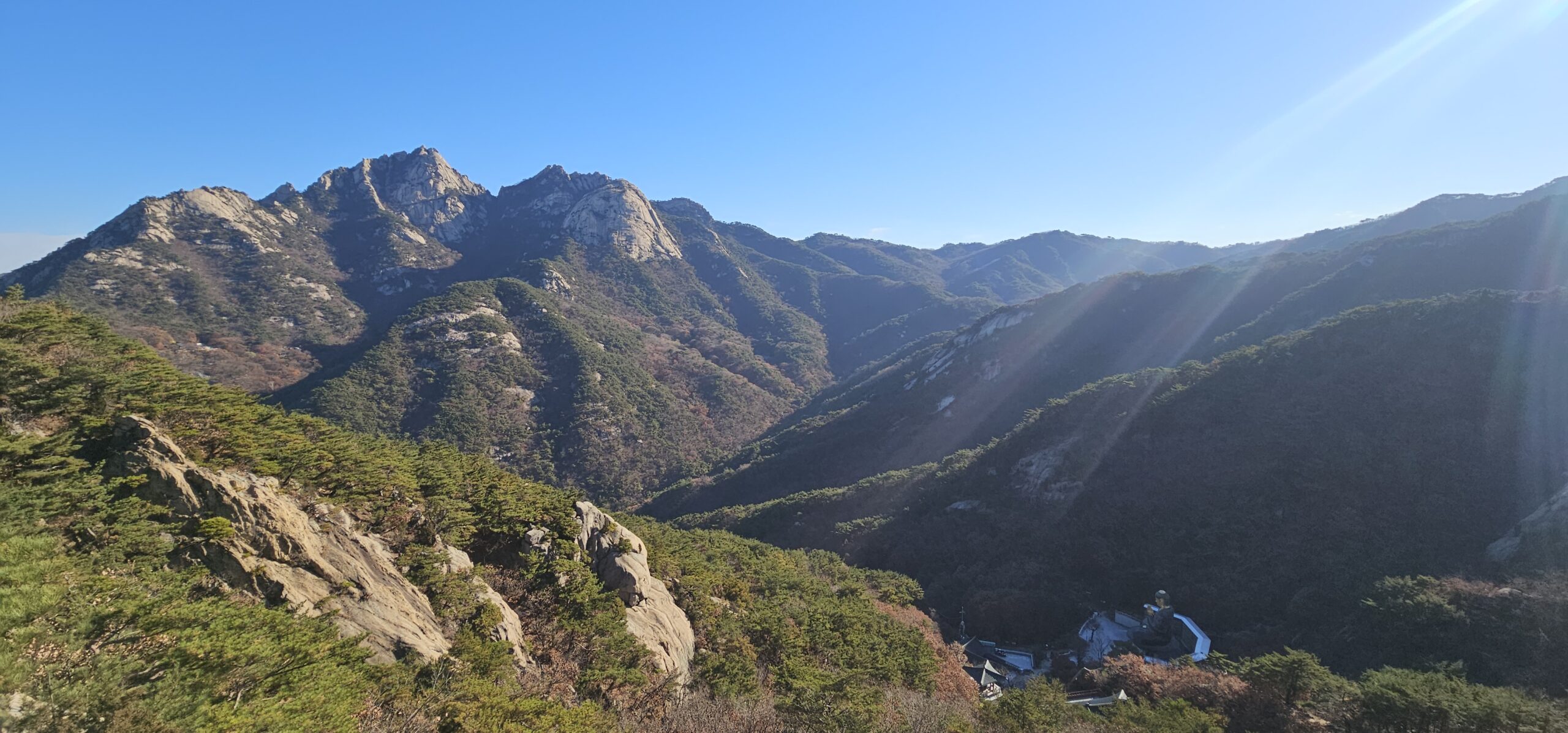 Trail runners enjoying a 20km route on Bukhansan, experiencing wild mountain trails in the heart of Seoul
